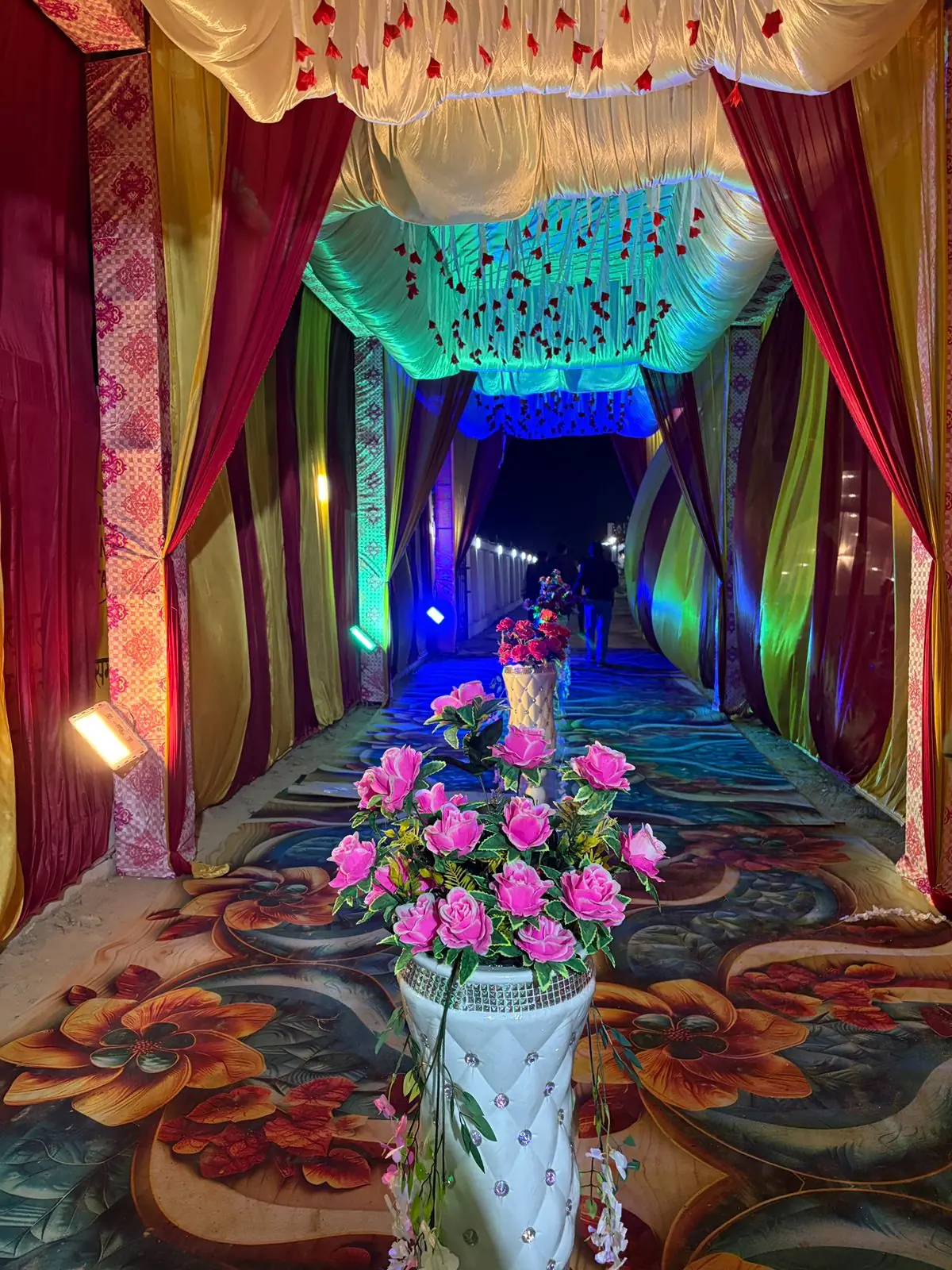 Illuminated walkway decoration for a wedding at Siya Mandapam
